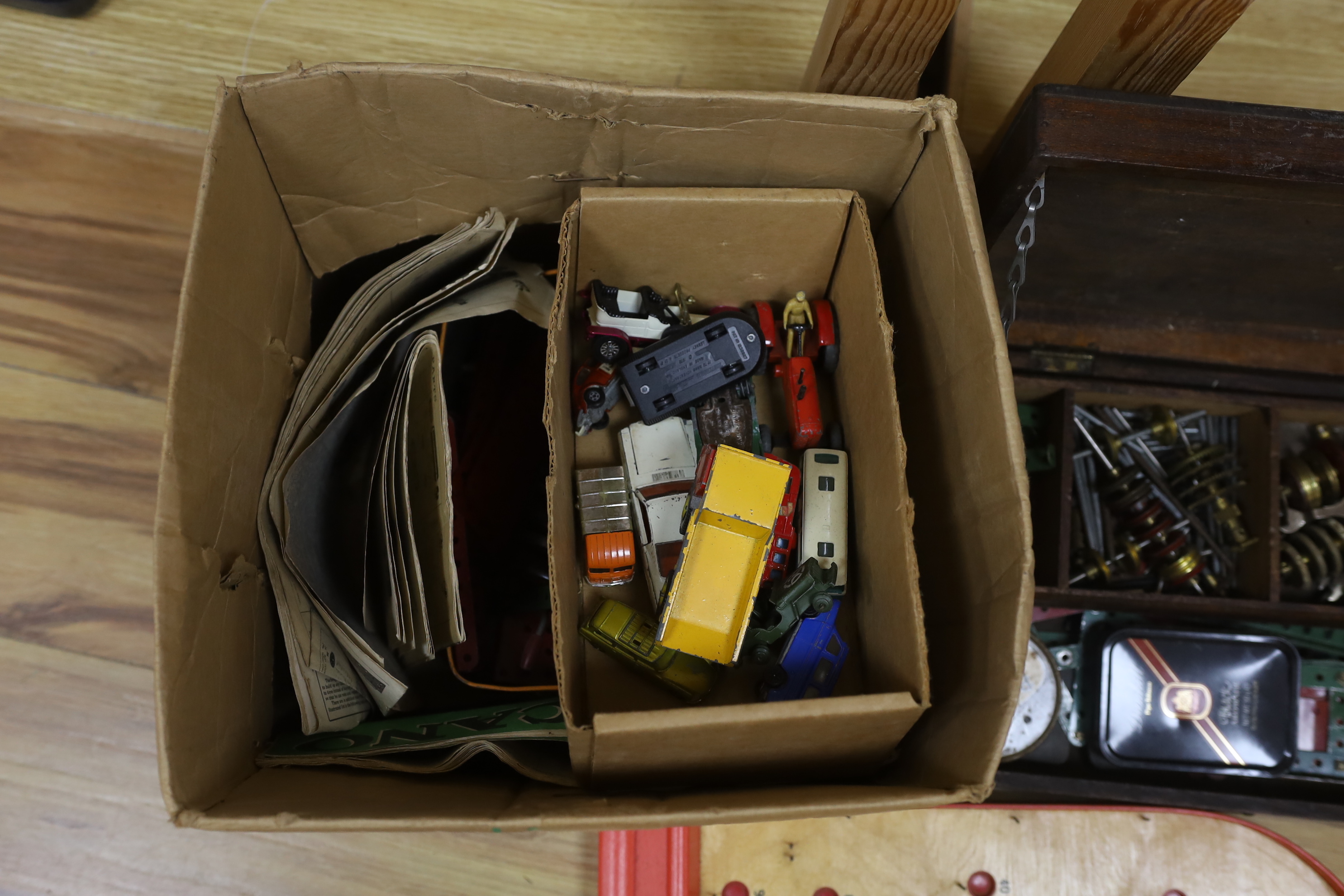 A quantity of Meccano, Dinky toys and a bagatelle board